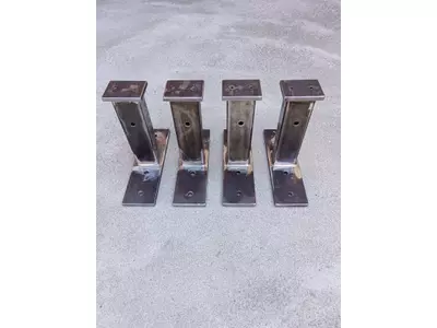 Example of welded mild-steel support brackets / mounting posts produced in small batch.  The parts consist of rectangular hollow sections, drilled base plates and top plates, welded by MIG/MAG process. Such components can be used as equipment supports, mounting brackets, auxiliary machine-frame elements or prototype support structures.  Production can be carried out according to customer drawings or technical documentation..jpg